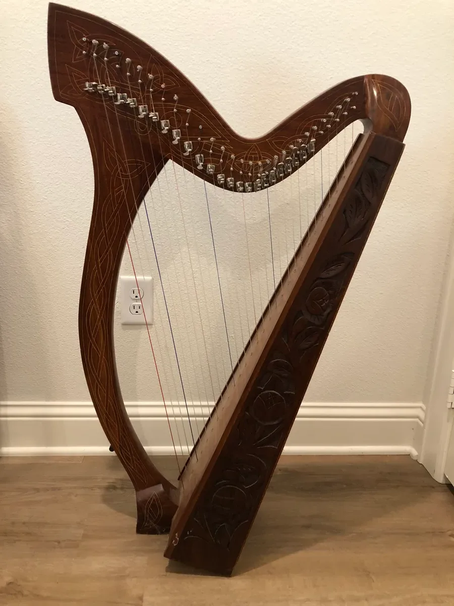 Karen playing the harp